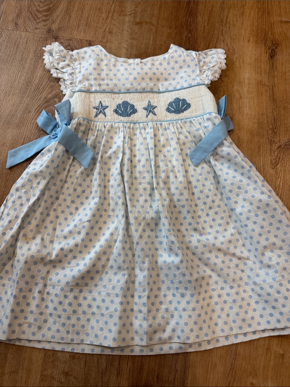 Smocked Blue Polka Dot Girls Dress with Side Bows